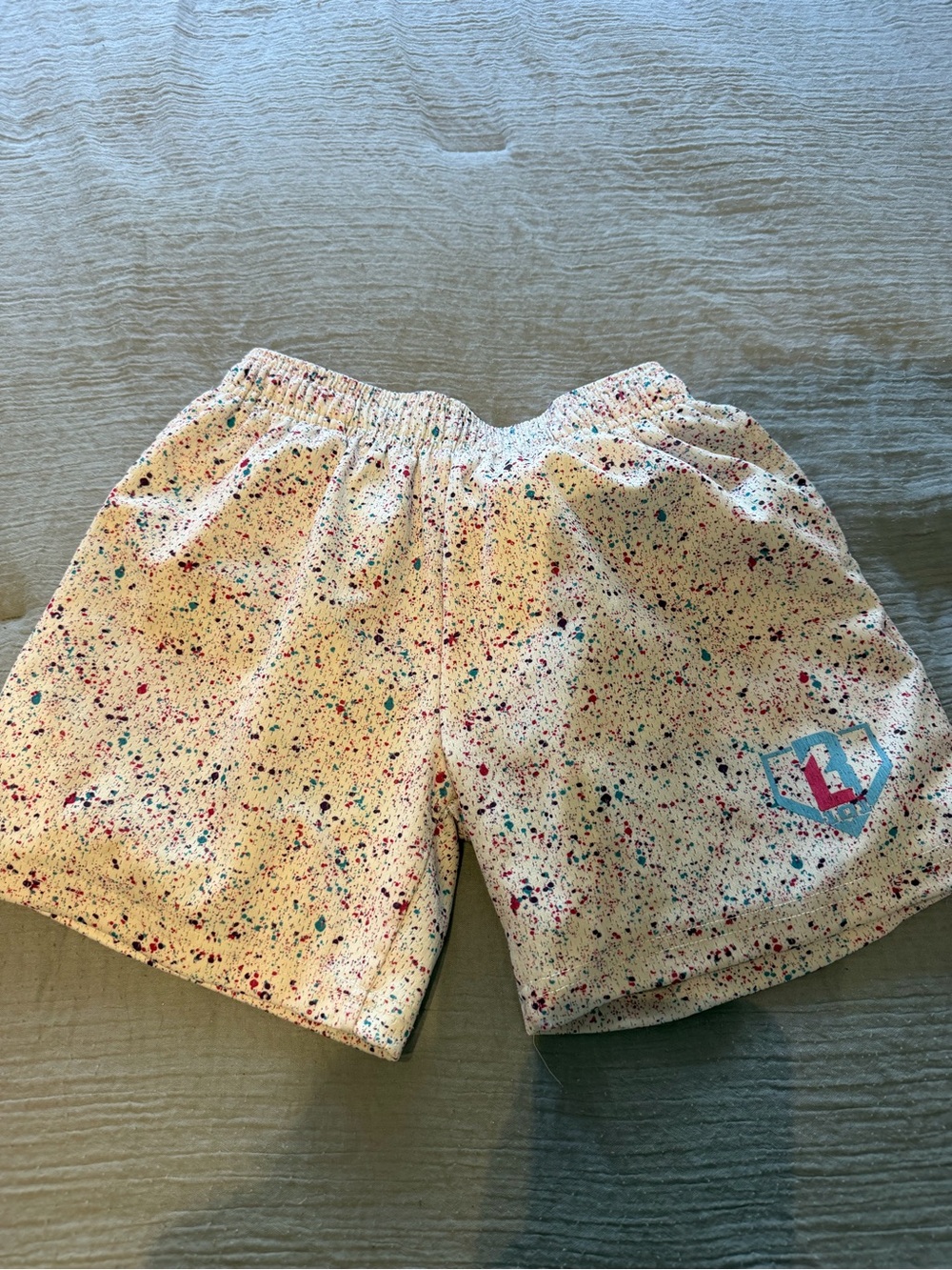 Kids Cream Speckled Shorts with Multicolor Print